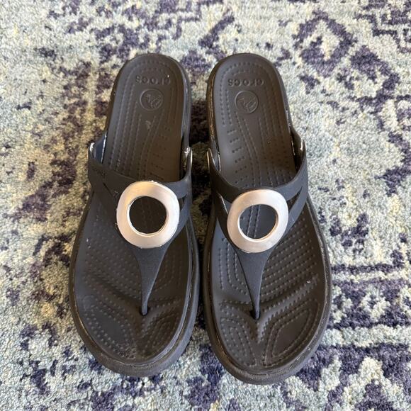 Shoes - Black Women’s Crocs Light Wedge Rubber Thong Sandals with Silver Ring Detail